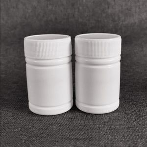 Livraison gratuite 100 pièces 30 ml 30cc 30g HDPE blanc vide bouteilles de pilules en plastique pharmaceutique avec bouchons scellants en aluminium Khaul