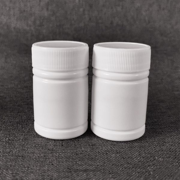 Livraison gratuite 100 pièces 30 ml 30cc 30g HDPE blanc vide pharmaceutique plastique médecine pilule bouteilles avec bouchons en aluminium scellants
