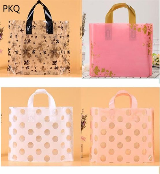 100 pièces 35x25 sacs en plastique avec poignées sac cadeau fleur colorée papillon vêtements emballage Boutique poignée Bags1925542