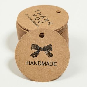 100pcs 4,3 cm rond Hangage Hang Tag Kraft Papier de remerciement étiquette d'étiquette cadeau pour le mariage / bonbons / bébé Gift Products Tag Package