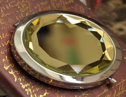 100pcs 7cm Miroir de maquillage pliant Miroir compact avec miroir de poche en métal en cristal pour le mariage Gift2285572