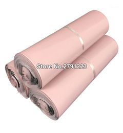 100pcs 9 tamaños bolsas de mensajería de color rosa claro