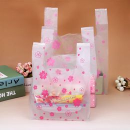 100 pièces/sac supermarché Shopping sac en plastique rose Sakura gilet sac cadeau cosmétiques emballage alimentaire sac bonbons sac 240322