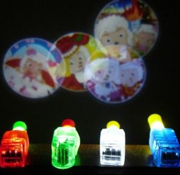 100pcs Cartoon LED LEC LED LED Láser Luces de dedo Beamas Antes de anillo Fiesta de Navidad Disco GLOW8060359