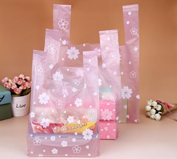 100pcs Sacs de gilet de haute qualité Shopping Hand Sac Emballage avec beaux sakura roses et blancs pour collations de sushis Gâteaux de boulangerie 9279412