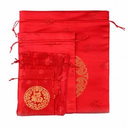 100 pcs/lot 10x14 13x18 16x19 17x22cm Dubbele borduurwerk Fu Red Drawring Satijn Silk Pouch Chinese Nieuwjaar Gift Packaging Bags N9OW#