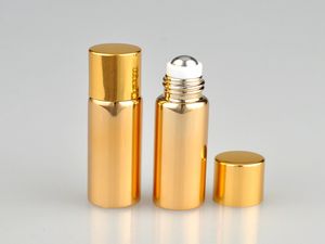 100 unids/lote 5ML UV botella de Perfume recargable de vidrio vacío con bola de Metal rollo en botellas de perfume botellas esenciales color oro plata