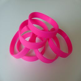 100 stks / partij Hoge kwaliteit Hot Pink Solid Silicone Armbanden voor promotie S040207