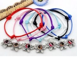 100 stks / partij Lucky String Lotus Bloem Evil Oog Charms Lucky Red Wax Cord Verstelbare Armband DIY Sieraden Nieuw