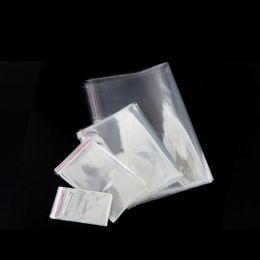 100 unids / lote Bolsas de plástico resellables Sellado autoadhesivo Bolsas de celofán OPP Bolsa de embalaje transparente para dulces