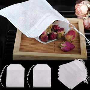 100 Pcs/Lot outils de sachets de thé jetables 5.5 x 7 CM sachets de thé parfumés vides avec du papier filtre de joint de guérison de ficelle pour les thés en vrac d'herbe