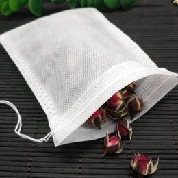 100 Pcs/lot sachets de thé 5.5x7 CM tissu vide sachets de thé parfumés avec chaîne guérir joint filtre pour herbe thé en vrac Bolsas