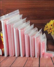 100 UNIDS Múltiples tamaños Pequeñas bolsas de plástico con cierre de cremallera Perlas de almacenamiento transparentes resellables Bolsa de joyería Bolsas de refrigerios de dulces de Navidad 1953802