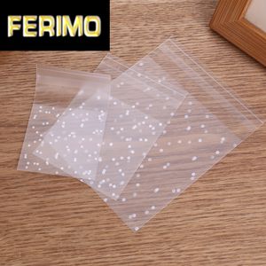 Sacs de cellophane en plastique 100pcs Sacs blancs Candy Cooky Cookie Sac-cadeau avec pain bricolage de pain auto adhésif