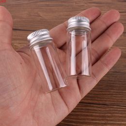 100pcs Taille 22 * 50mm 10ml Bouteilles d'épices de parfum en verre transparent Petits bocaux Flacons avec bouchon à vis en argent DIY Crafthigh qty