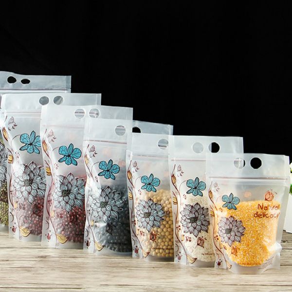 100 pièces Transparent alimentaire stand up poche collations scellé emballage sacs fleur thé noix fruits secs longane ziplock sac