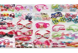 100pcslot Big Fashion Dog Apparel Pet Pet Cat Cute Bow Ties Necclues Bowknot Dog Products Products mixtes Ly035513920