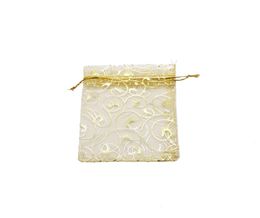100pcslot Gold Eyelash Organza Bolsas de joyería 12x9cm Champagne Candy Gift Jewelry Packaging Bag Wedding Party Favor Bags Earring8113026