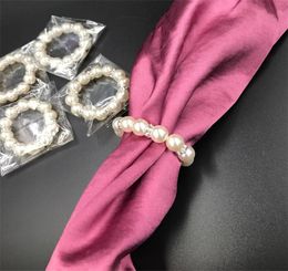 100pcslot White Pearls servet ringen bruiloft Napkin gesp voor bruiloftsreceptie feesttafel decoraties benodigdheden i1212563921