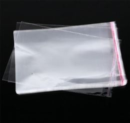 100pcsLots bolsas de polietileno OPP de celofán resellable ropa gruesa transparente paquete de ropa bolsa de almacenamiento sobre regalo Wrap7505886