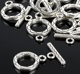 100 sets / partij Tibetan Silver Toggle Clasp Ring 12 * 15mm Bloemontwerp Ronde Clusps voor Armband Ketting DIY Sieraden Bevindingen