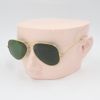 Gold frame green lens