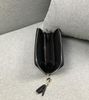 Tassel with the white letter c