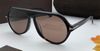 black frame brown lens