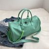 Зеленая дорожная сумка