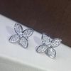 platinum +flower earring