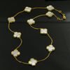 18k gold with white shell