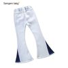 white bell-bottom jeans