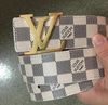 White belts with gold buckle