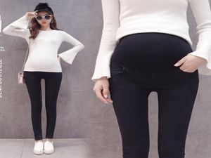 1032 Pantalones vaqueros de maternidad elásticos negros con cintura elástica, pantalones de tubo para el vientre, ropa para mujeres embarazadas, pantalones de embarazo de otoño 5749613