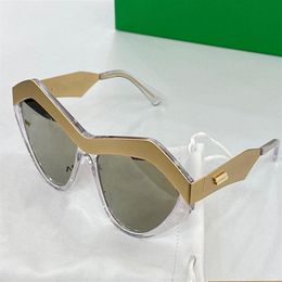 1055S Nouvelles femmes lunettes de soleil mode lunettes de soleil diamant lentille anti-UV enduit lentille miroir plein cadre couleur enduit diamant oeil de chat Fram302z