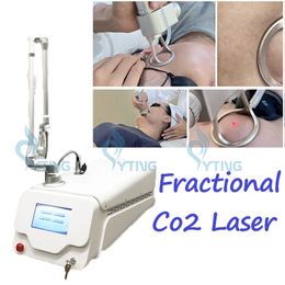 Máquina láser fraccional de Co2, tratamiento de cicatrices de acné, eliminación de estrías, rejuvenecimiento de la piel, estiramiento vaginal, 10600nm