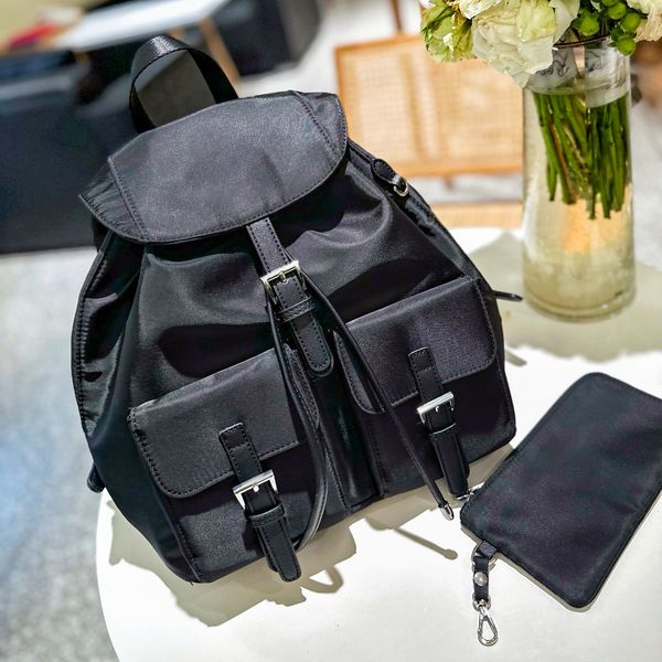 10A Triángulo de alta capacidad Mochila de diseño Estilo Nylon Libros de cuero genuino Bolsa mochila mochila Para mujer para hombre equipaje de moda Mochilas deportivas al aire libre Mochila escolar