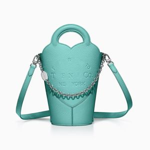 10A Echte koeienhuid tas emmer tas dames een schouder crossbody tas designer tas handtas Litchi graanketting decoratie tote luxe boodschappentassen lederen tas tiffanyity