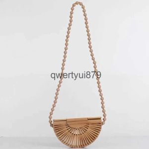 10A Bolsos de hombro Fasion andmade pulsera de raíz de bambú tejido de bambú ollow literario mini flip pone bolso femenino H24131