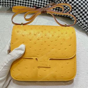 10A Top Sac à bandoulière de concepteur de haute qualité Sac à bandoulière 24CM Sac de selle en cuir véritable d'autruche Sac jaune de luxe Sac de messager de mode Emballage de boîte-cadeau Sac de dame