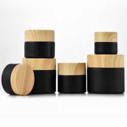 10g 30g 50g Black Frosting Bottle Bottle Bottles Cosmetic Glass Jars con cubierta de grano de madera Subbottling Set257H