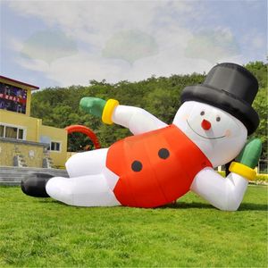 10m de long (33 pieds) jeux personnalisés de chariot de Noël décoration gonflable de neige gonflable allongé décoration debout Ballon Air Chigure d'hiver allongé avec un chapeau rouge