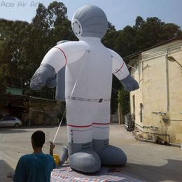 10mh (33 pieds) Casque gris gris vif Corps blanc Posé Modèle de caractère astronaute gonflable avec sac d'espace sur le dos fait en Chine pour la publicité en vente