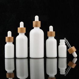 Flacon compte-gouttes d'huile essentielle blanche de 10ml 15ml 30ml, récipient d'emballage de pipette en verre cosmétique avec couvercle en bambou à grain de bois cap2625