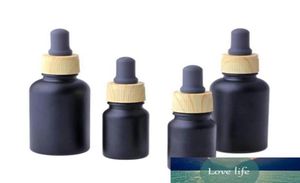 Bouteilles d'huile essentielle en verre noir mat 10ml 30ml, flacons compte-gouttes en verre, récipients cosmétiques, couvercles en plastique pour grains de bois 2743071