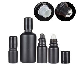 10ml 5ml 15ml 20ml 30ml 50ml 100ml Parfum Roll On Glass Bottle Black Frost avec des flacons d'huile essentielle de rouleau de boule de verre en métal