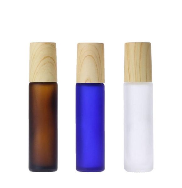 10 ml Ámbar Azul Claro Vidrio esmerilado Rollo en botella Aceite esencial Botella de perfume Dispensador de viaje Botella Rodillo de acero Bola Madera Gra7088597