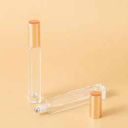 10 ml de stylo carré vide en verre transparent en verre sur bouteille avec capuche doré à rouleau en acier inoxydable pour le parfum d'huile essentielle mode