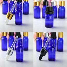 10 ml mini bouteilles de gouttes en verre bleu vide aromathérapie bouteille d'huile essentielle bouteilles de petites bouteilles avec capuchon en argent en or noir