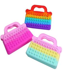 10pcs / dhl bulle par sac arc-en-ciel des couleurs massives sac à main pour les enfants de la fête de Noël push pusts sacs de table de plateau sensoriel sac de chaîne filles